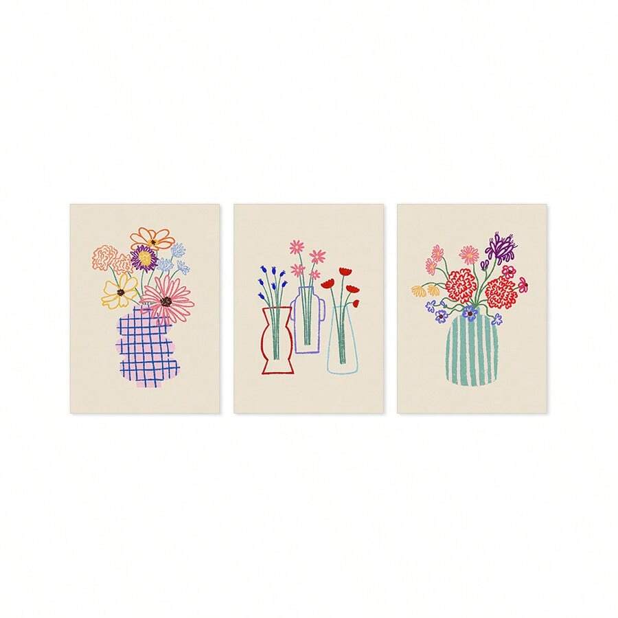 Unframed trio of hand-drawn flower vase canvases on a plain light background