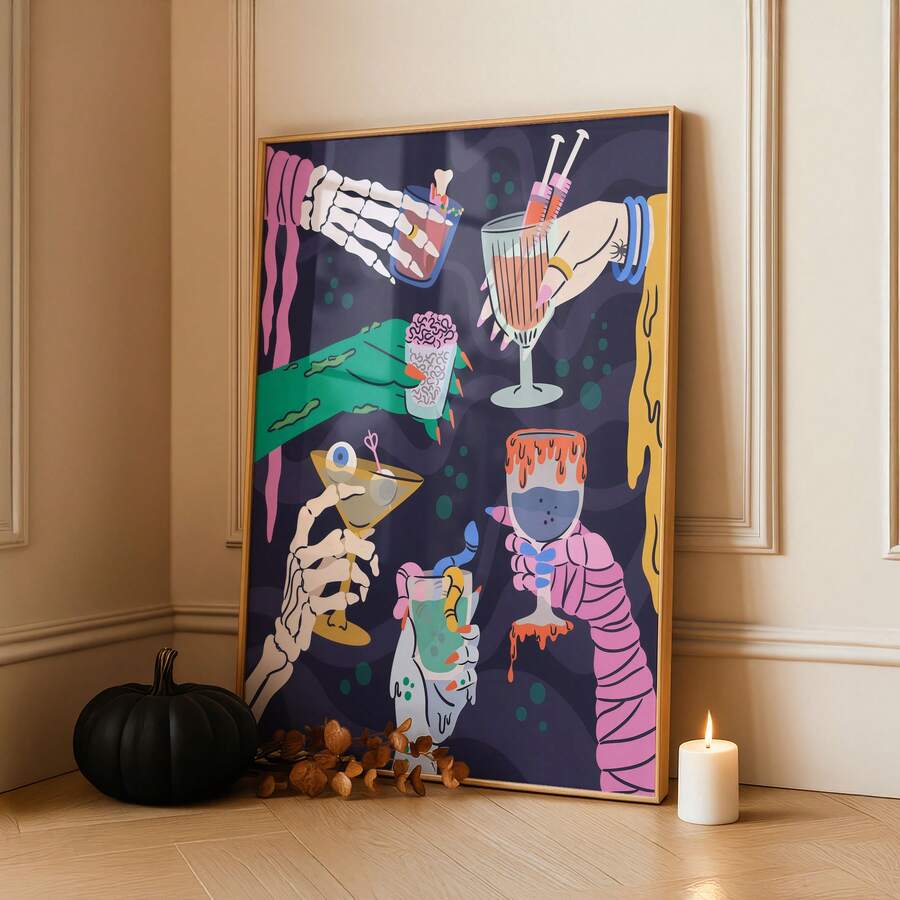 Gothic Halloween cocktail artwork framed beside a pumpkin, candle, bats, and skull
