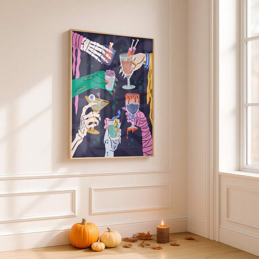 Halloween wall art displayed above pumpkins and candles in a bright room