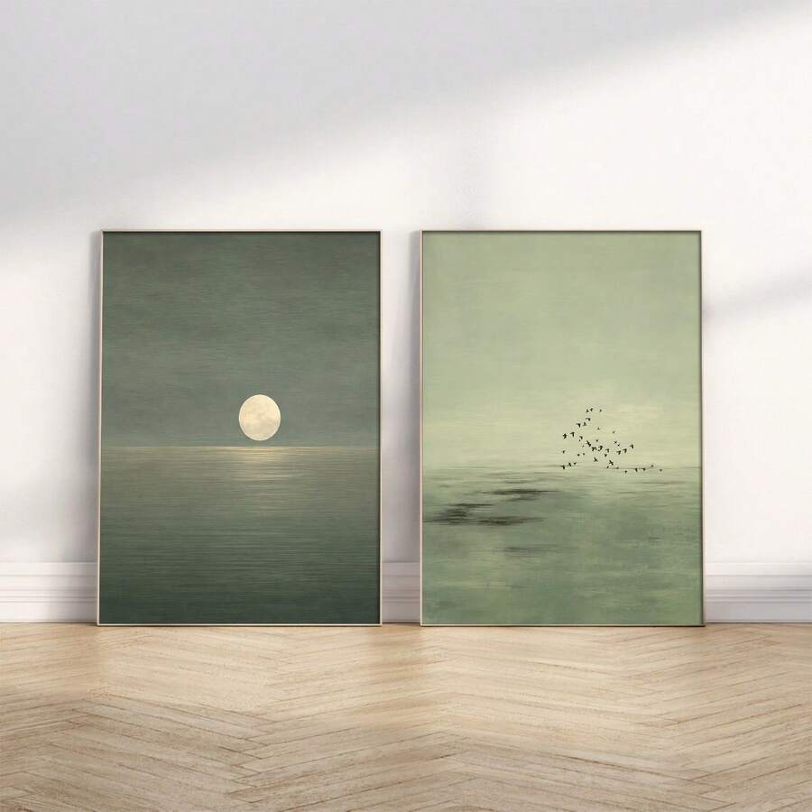 Two sage green ocean prints: full moon over water and birds above a misty sea
