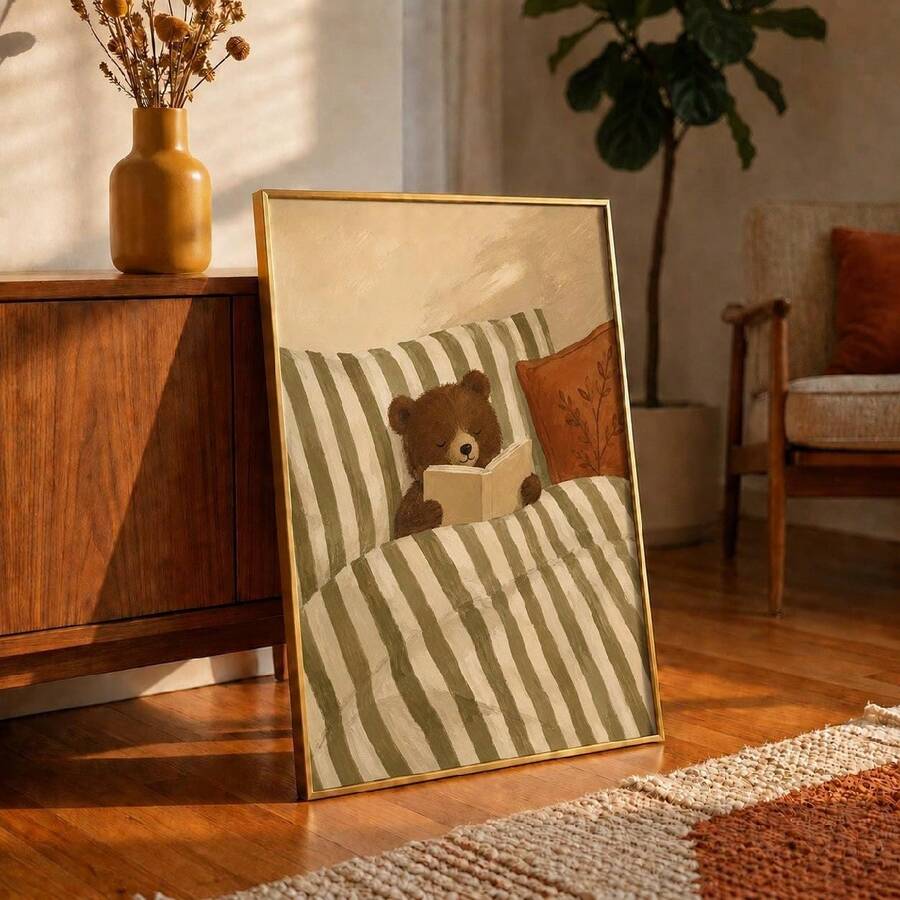 Storybook bear poster styled on a wood floor beside a linen basket and plant