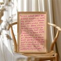 Pink motivational quote canvas on light wood chair by bright window
