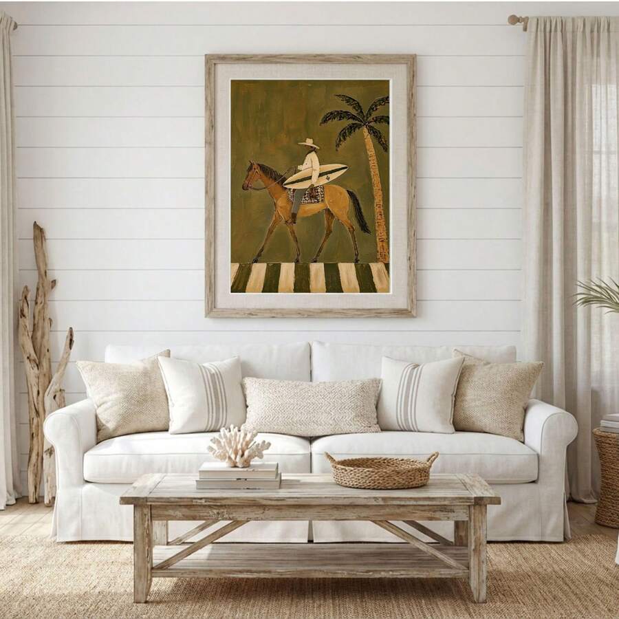 Vintage surf horse canvas displayed above a white sofa with neutral coastal decor