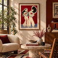 Bold fashion illustration framed above a console in a red-accented living room