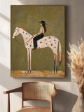 Black-hatted cowgirl riding a pale horse against a textured olive backdrop