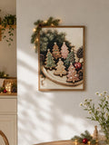Framed cookie-tree artwork hung above a cabinet with holiday greenery and small festive decor