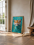 Teal swimming tiger canvas leaning on floor in bright neutral room