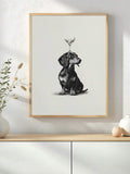 Dachshund martini artwork in a gold frame against a sunlit kitchen wall