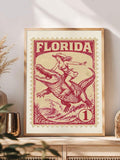 Western cowboy and covered wagon stamp wall art in a rustic framed display