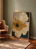 Oversized golden and ivory iris canvas leaning beside wicker chair and patterned rug
