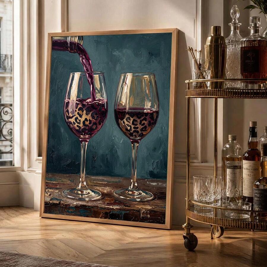 Leopard wine glass canvas artwork beside a brass bar cart