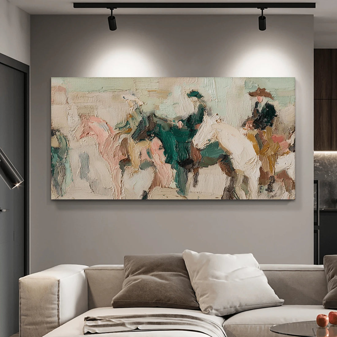 Textured abstract horse and rider canvas framed above a deep green sofa