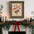 Vintage Santa in a martini glass artwork displayed above a candlelit evergreen mantel