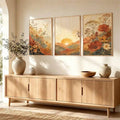 Botanical sunset wall art styled over a warm wood sideboard