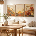Framed wildflower landscape triptych above a dining table and sofa