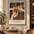 Cocktail toast photograph print with Good Company caption in a warm dining interior