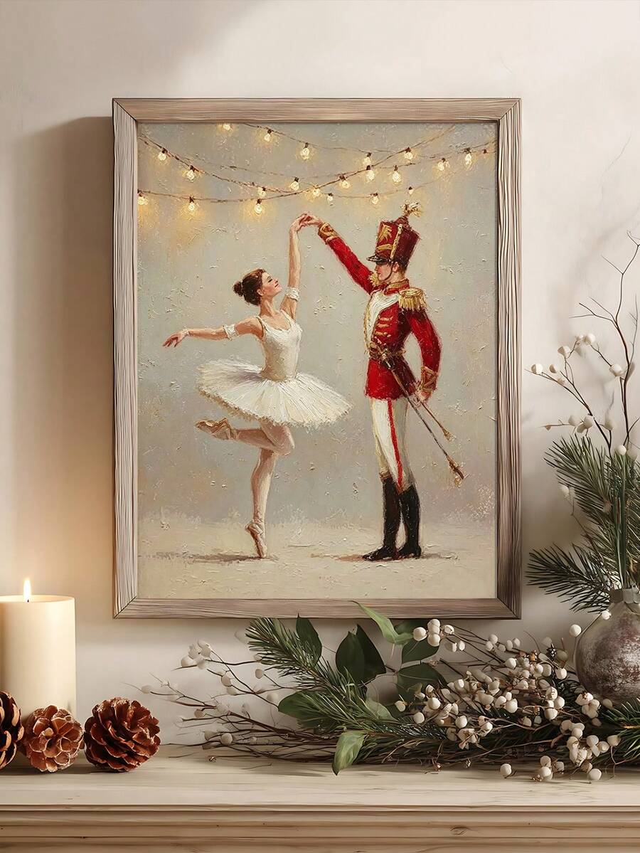 Framed ballerina and red nutcracker dancing beneath warm lights on a decorated mantel
