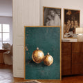 Framed teal Christmas ornament artwork styled in a warm modern room