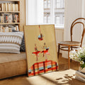 Framed retro party poster leaning beside a sofa and woven chair in a bright room