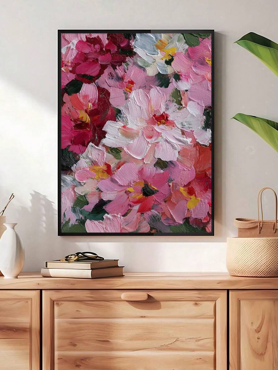 Pink and cream peony botanical poster displayed in a gold frame beside a dresser and natural decor