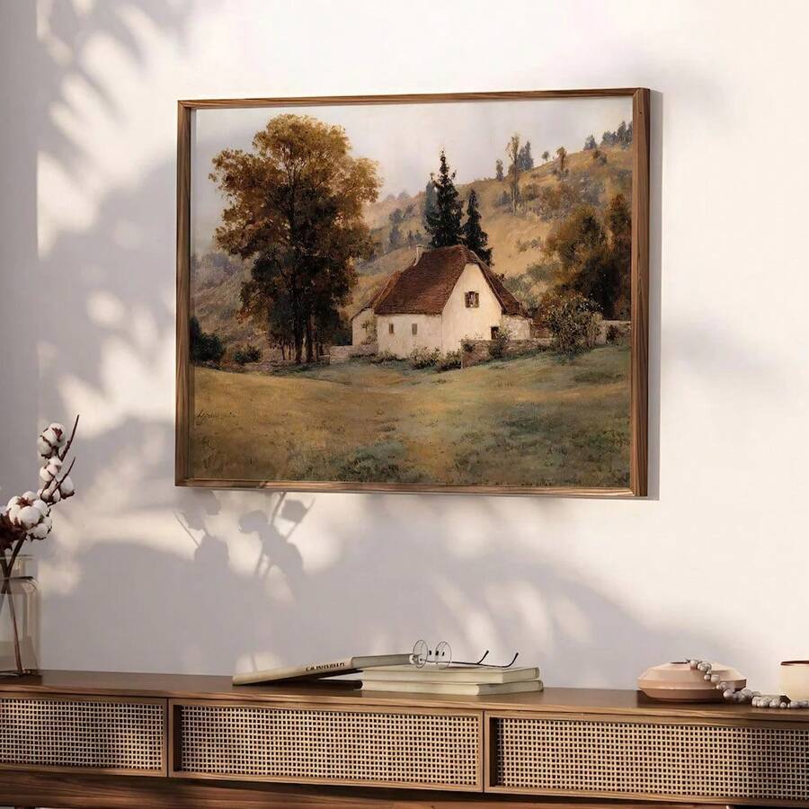Rustic autumn cottage wall art with rolling golden hills in a wood frame