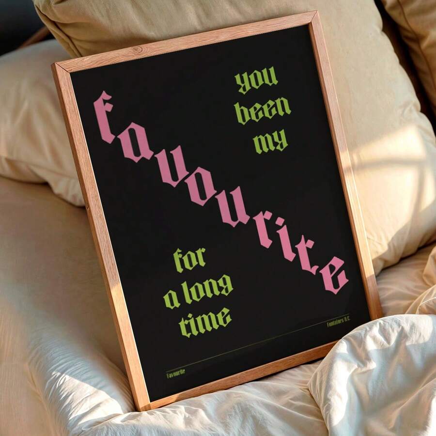 Blackletter favourite lyric poster resting on soft white bedding