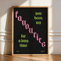 Pink and lime lyric typography print styled in a light modern room