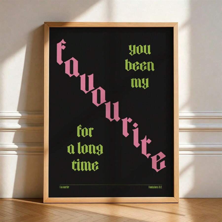 Pink and lime lyric typography print styled in a light modern room