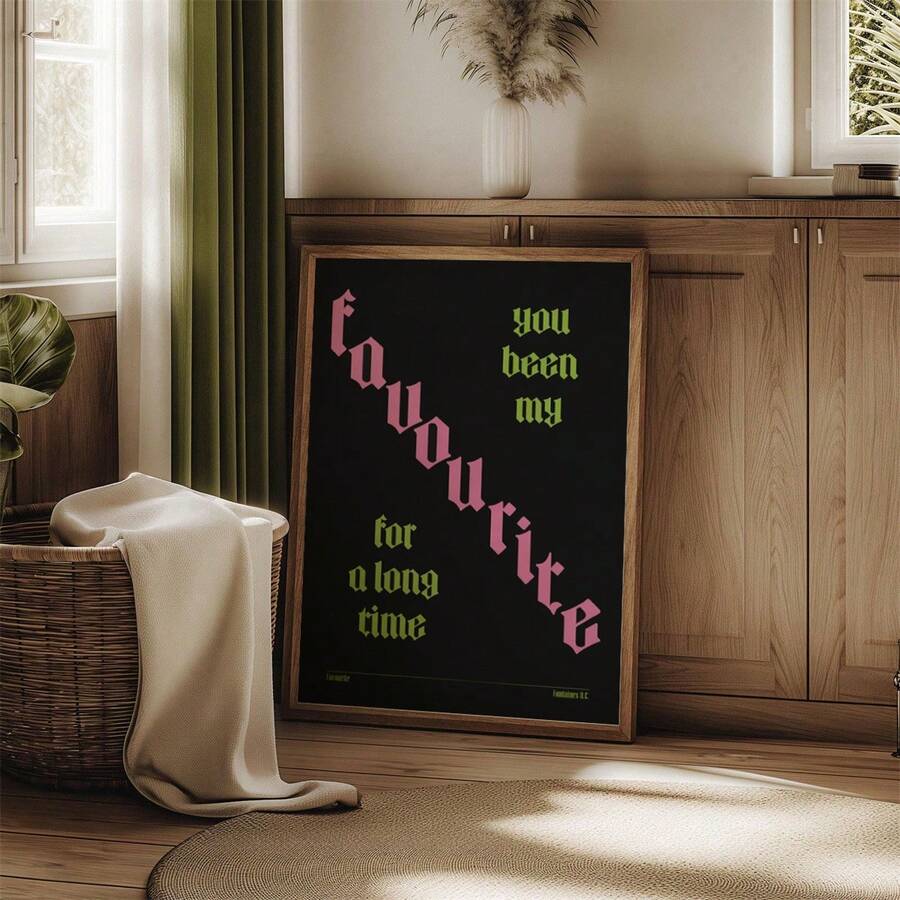 Framed lyric canvas displayed beside warm wood cabinetry and a bright window