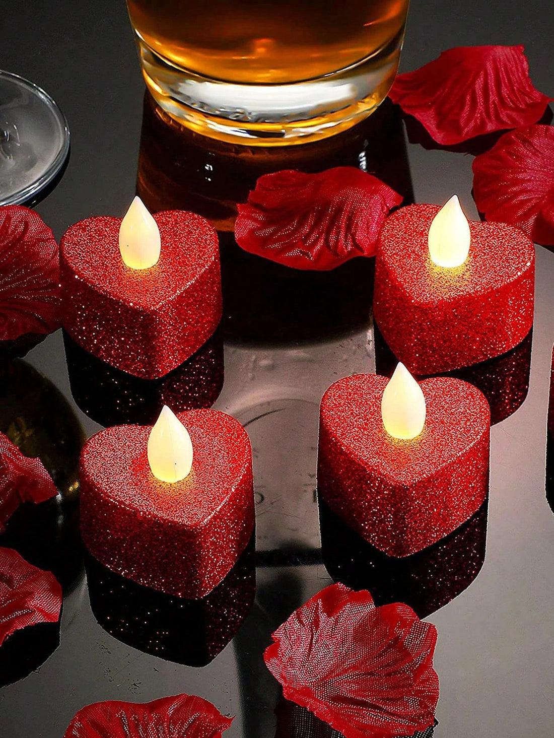 Add a touch of romance to any occasion with our set of 24 heart-shaped flameless LED candles. Enjoy the beauty of candlelight without the worry of flames or melting wax. Perfect for weddings, date nights, and Valentine's Day decorations. Create an intimate and safe ambiance with these candles.