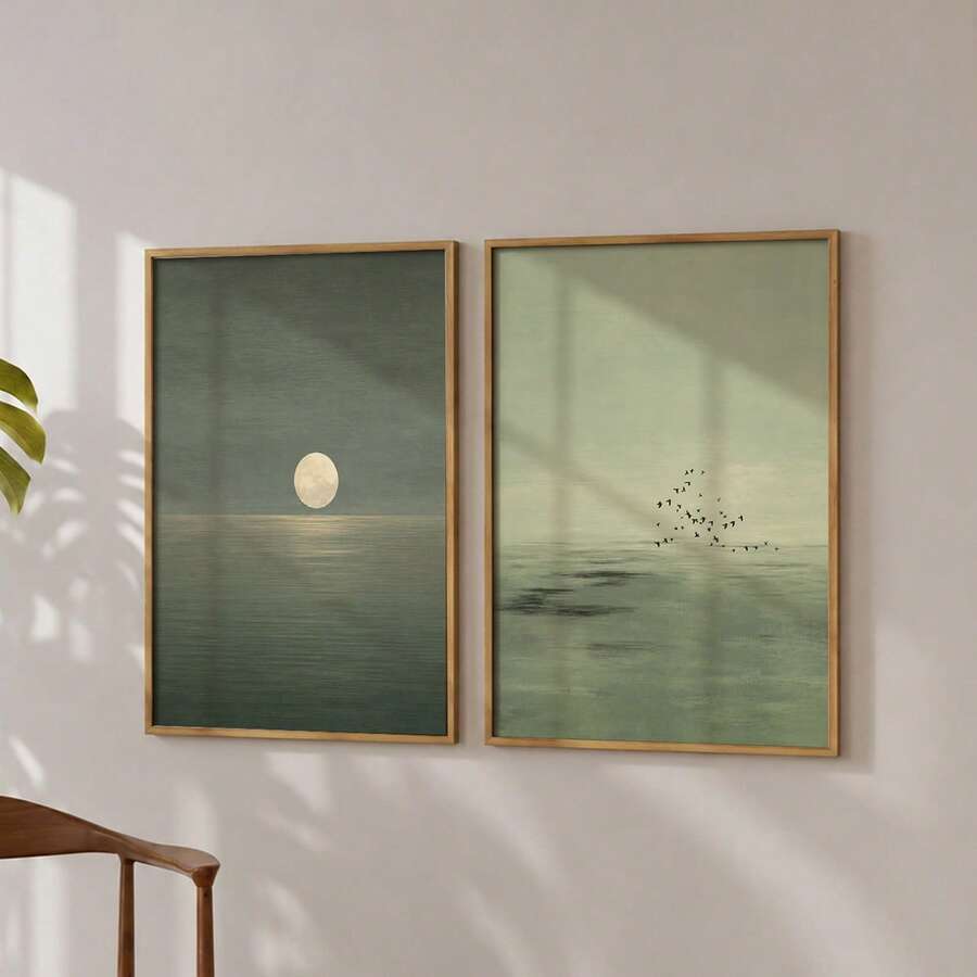 Two sage green ocean prints: full moon over water and birds above a misty sea