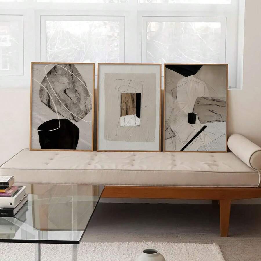 Three piece neutral abstract wall art set with beige black shapes and wood frames
