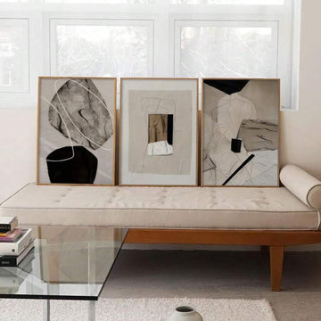 Three piece neutral abstract wall art set with beige black shapes and wood frames