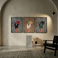 Three framed zebra-print cowboy boot artworks in an arched modern living room