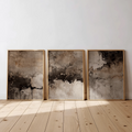 Three framed wabi-sabi abstract canvas posters in beige brown and charcoal