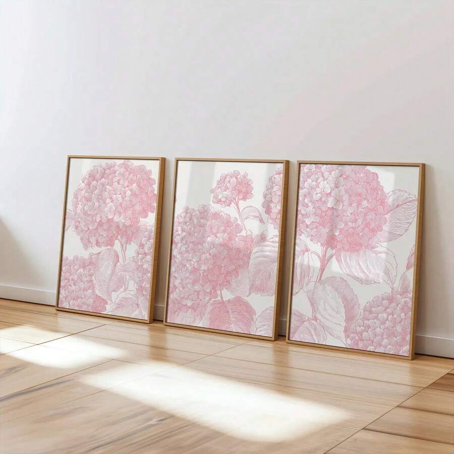 Three-piece light pink hydrangea canvas poster set in a bright living room