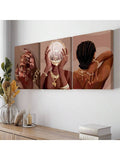 3pc Afrocentric canvas wall art set above console with Black woman beauty illustrations in brown gold tones