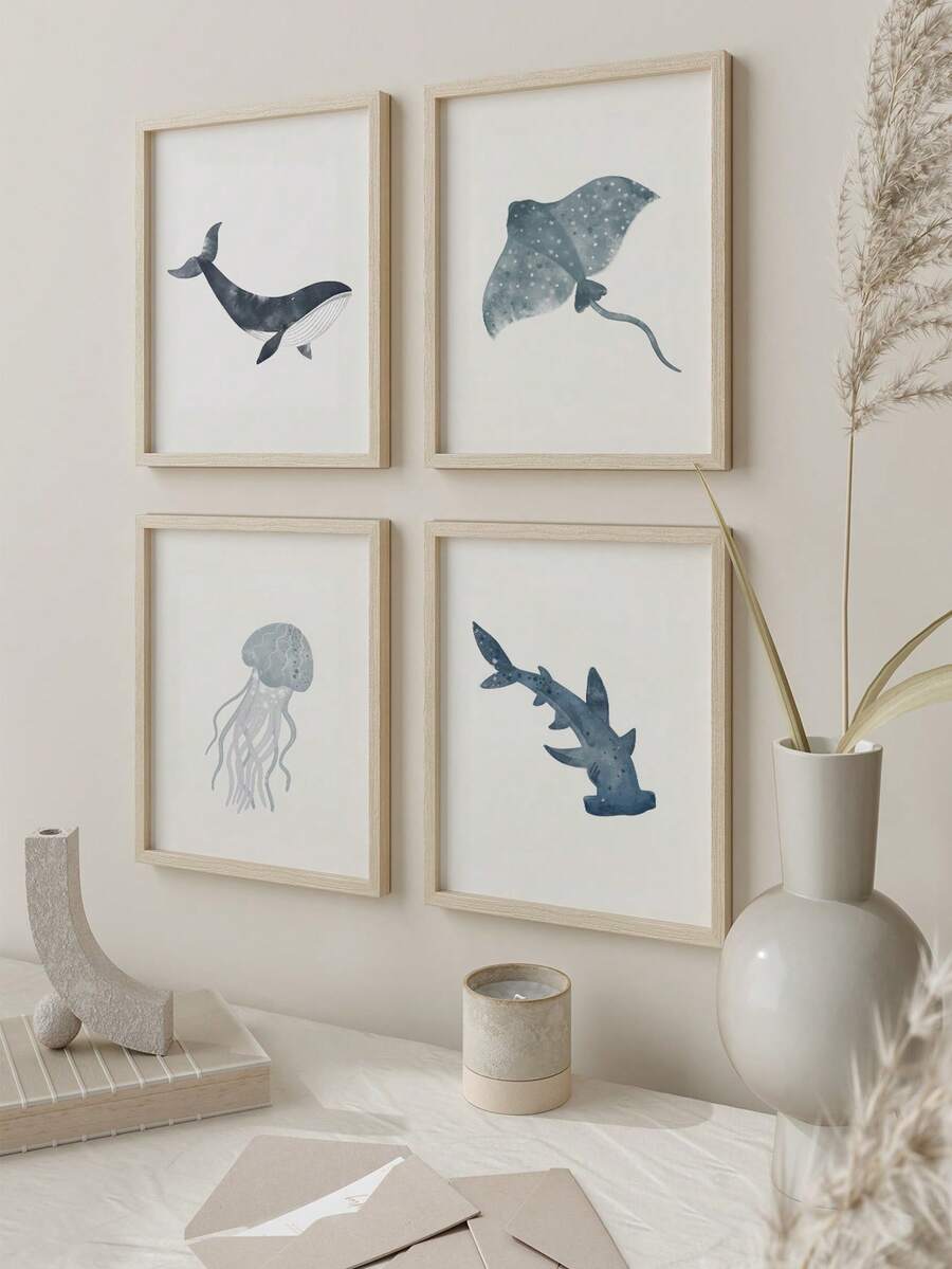 Four watercolor ocean animals in natural wood frames