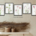 Botanical flower print grouping above baskets and dried palm leaves