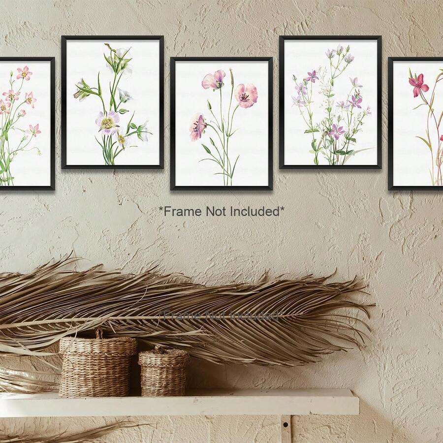 Botanical flower print grouping above baskets and dried palm leaves