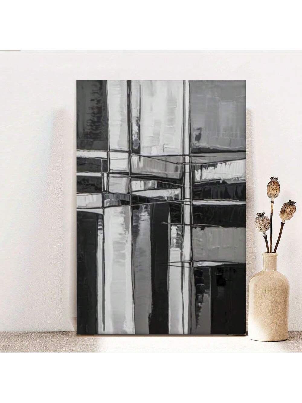 Elevate your living space with this abstract black and white line art canvas print, expertly framed to enhance any modern interior. Its minimalist design adds a sophisticated touch while the monochrome palette ensures versatile integration with various decor styles. Crafted for durability and visual impact, this piece serves as a focal point that brings subtle elegance and contemporary flair to your home.