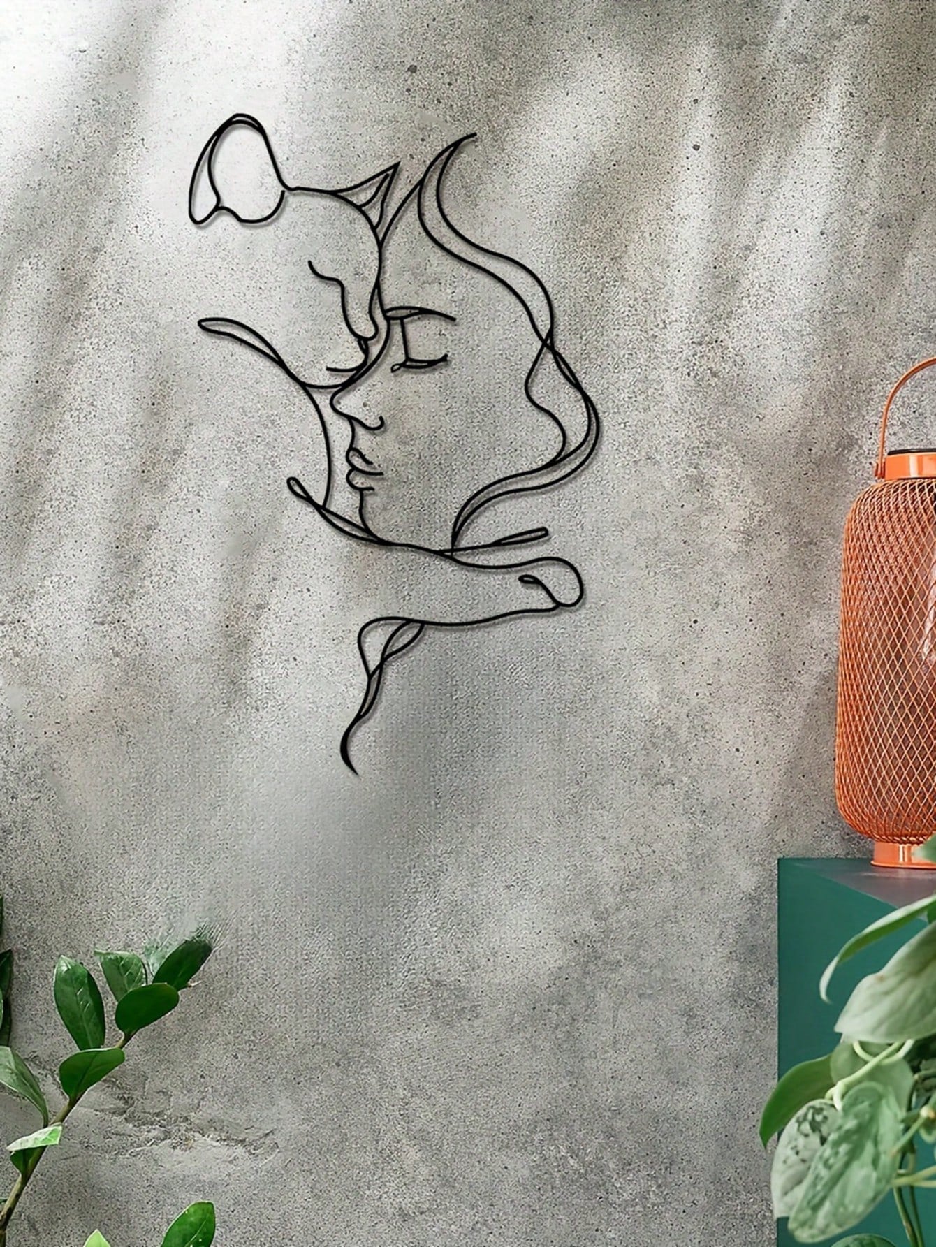 This Abstract Cat Line Art Metal Decor is the perfect addition to any cat lover's home. With its minimalist design and sleek metal finish, it adds a touch of sophistication to any room. Bring out your inner art connoisseur with this unique piece.