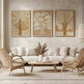 Minimalist botanical tree canvas prints arranged above a console