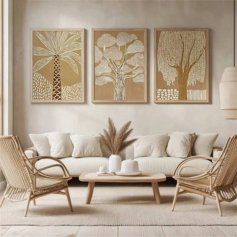 Minimalist botanical tree canvas prints arranged above a console