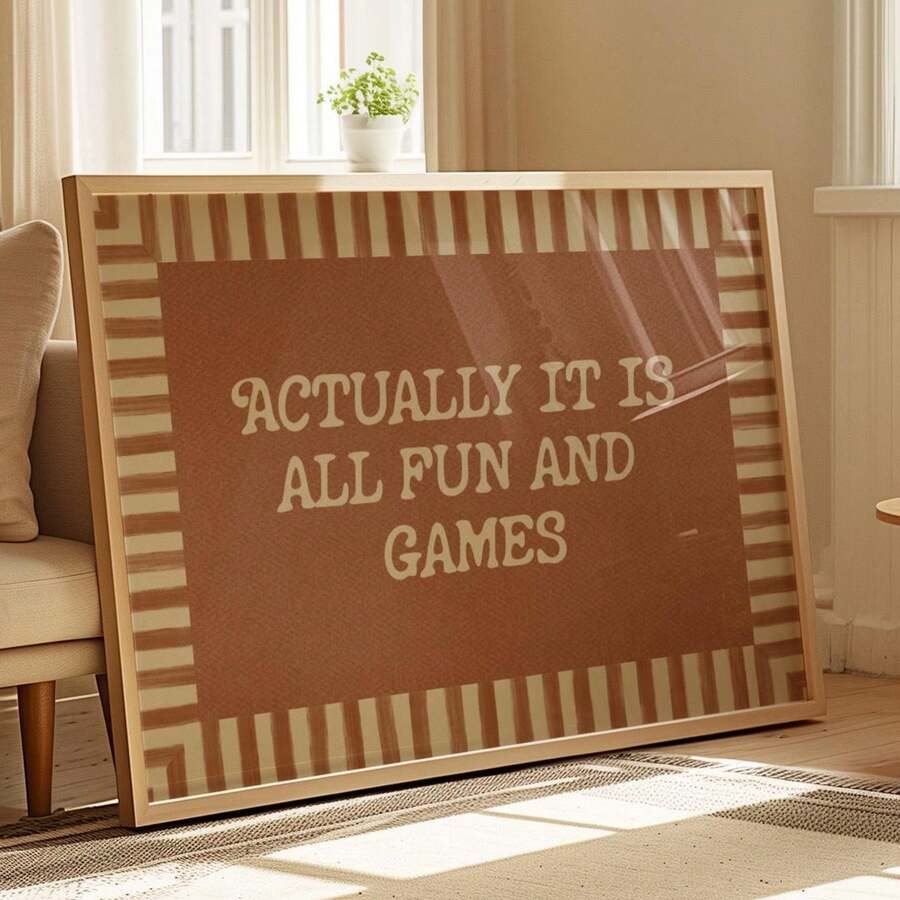Actually It Is All Fun And Games retro typography canvas poster in a light wood frame