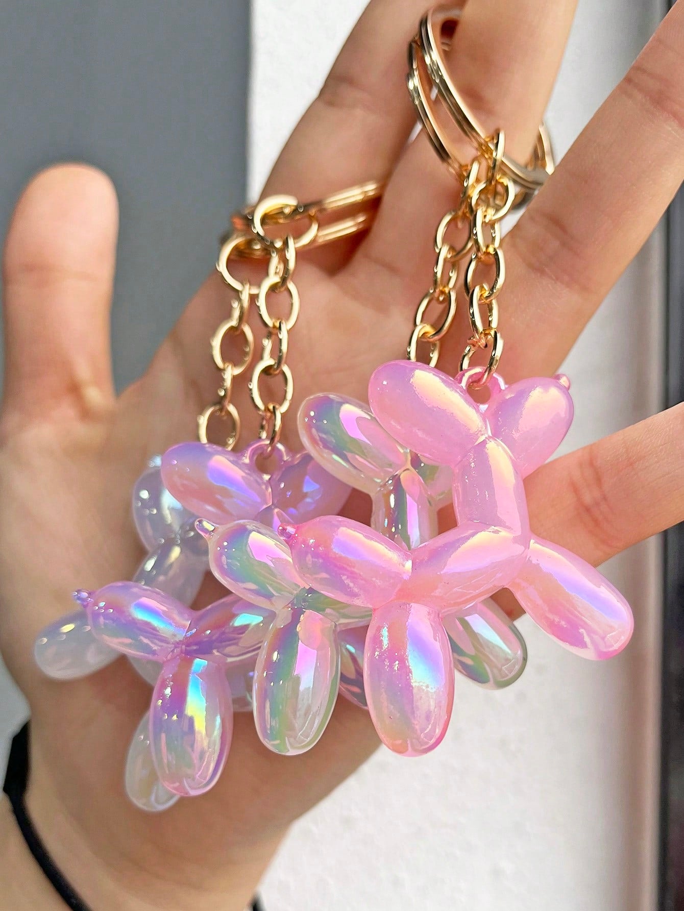 Elevate your style with our Adorable Balloon Dog Keychain! This cute accessory is perfect for adding a touch of personality to your bags and keys. Crafted with high-quality materials, it is designed to be both durable and stylish. A must-have for any dog lover!