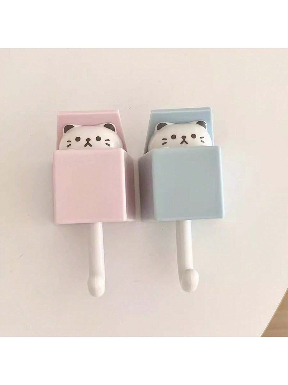 Enhance your home decor with these adorable cat-themed wall hooks. Made with waterproof materials, these cute and decorative hangers are perfect for organizing any room. Each hook is designed with attention to detail, adding a touch of charm to your space while keeping it tidy.