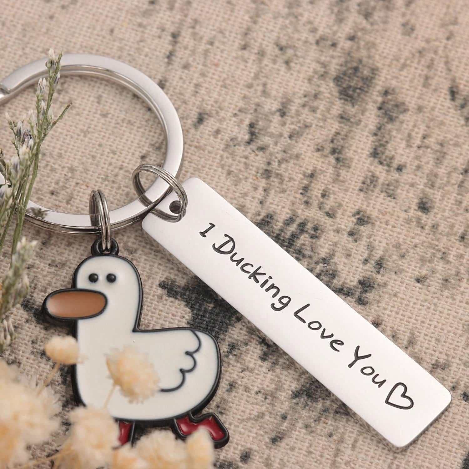 The Adorable Duck Keychain is the perfect accessory for duck lovers. Made of high-quality stainless steel, this creative pendant is not only durable but also adds a touch of cuteness to any bag or gift. Show off your love for these lovable creatures with this unique keychain.