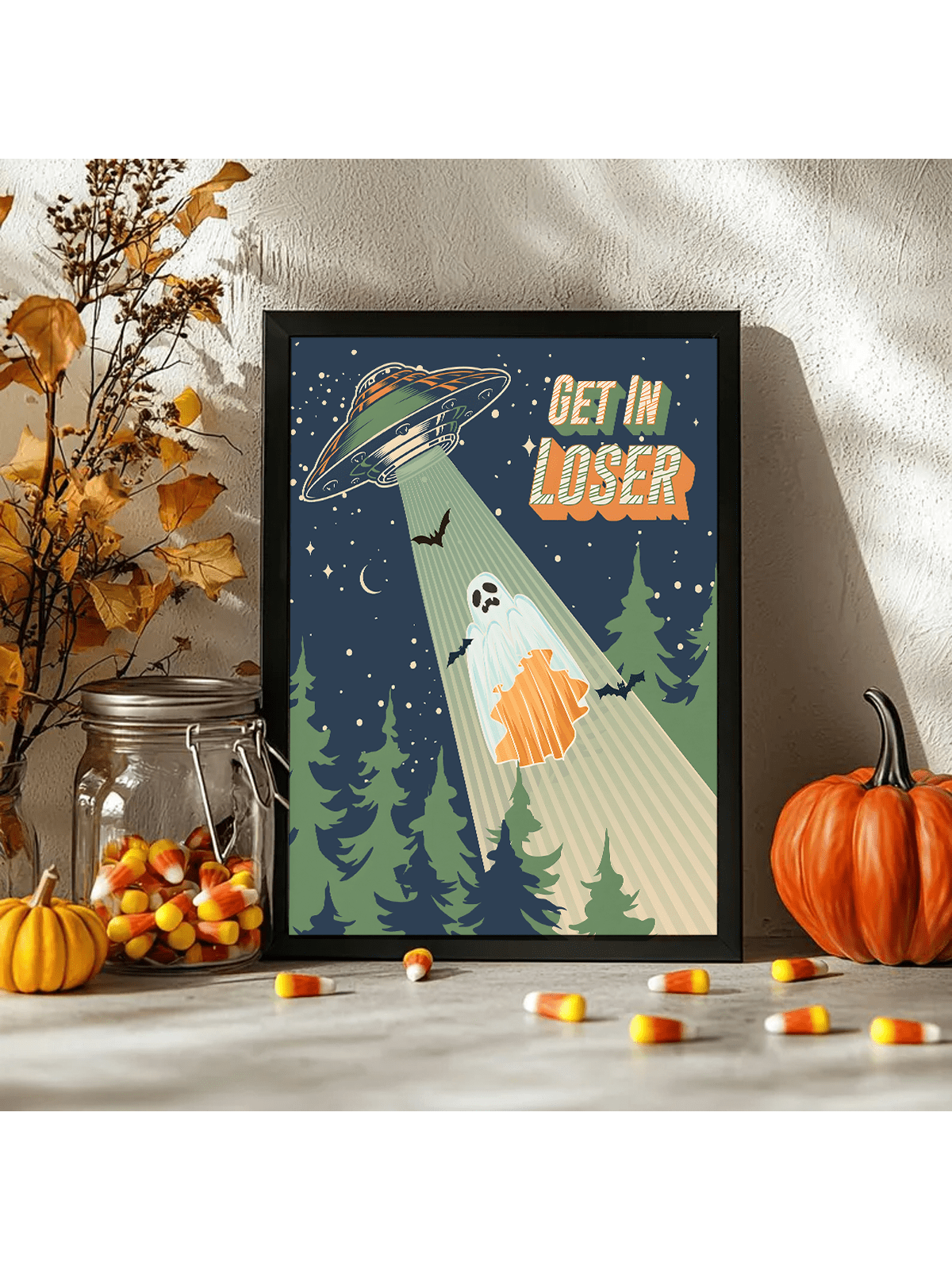 Celebrate the spooky season with this charming Halloween canvas print featuring a playful ghost, a friendly bat, and a whimsical UFO alien. Perfect for adding a touch of fun and creativity to your home décor, this artwork blends festive spirit with imaginative design. Crafted to brighten any room, it’s an ideal choice for those seeking unique, expert-curated seasonal decorations.