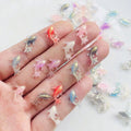 Add a touch of cuteness to your crafts and jewelry with our Adorable Mini Shiny Goldfish Resin Figurines! With 100 pieces per pack, you'll have plenty to work with. Made from high-quality resin, these figurines are perfect for adding a unique and eye-catching element to your creative projects.